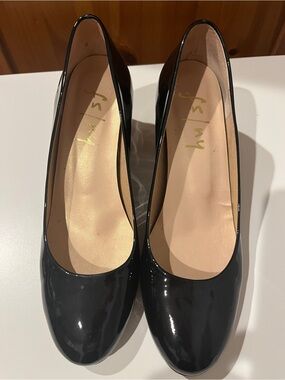 French Sole Trance pumps in black patent leather